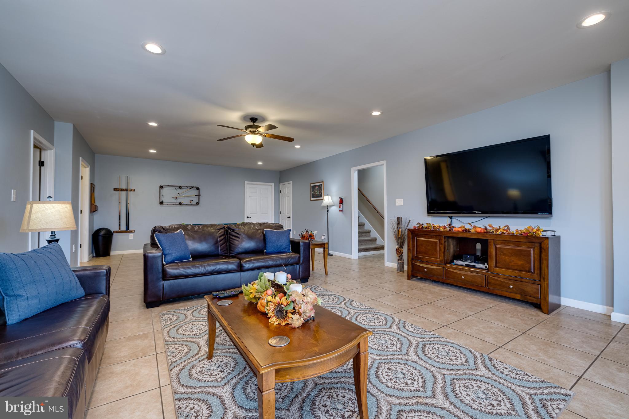 2225 Valley Burg Road Luray, VA 22835 - Photo 27 of 74 a living room with furniture and a flat screen tv