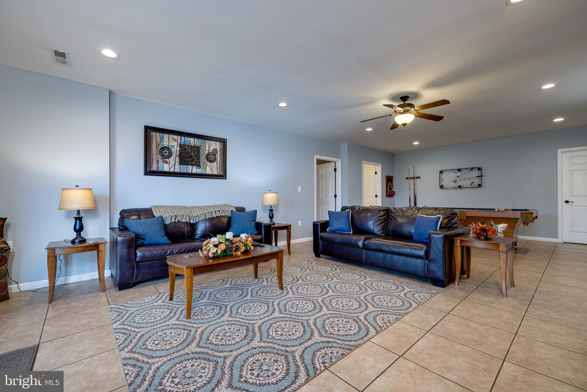 2225 Valley Burg Road Luray, VA 22835 - Photo 28 of 74 a living room with furniture and a lamp