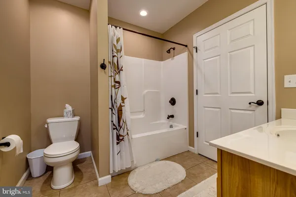 an open kitchen with a table and chairs in it