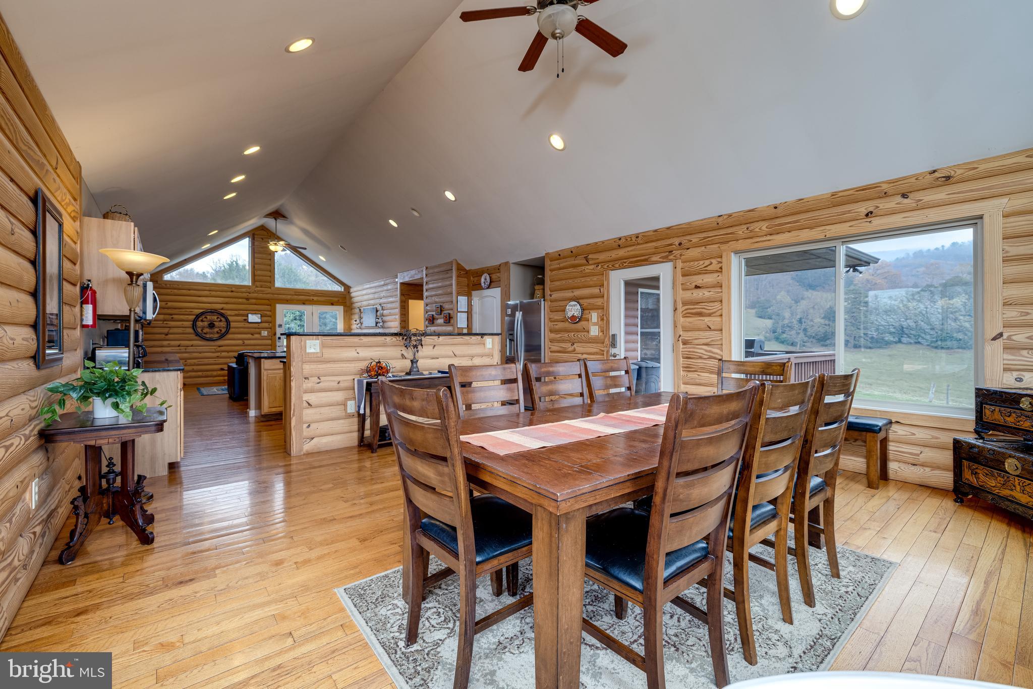 2225 Valley Burg Road Luray, VA 22835 - Photo 44 of 74 a view of a dining room with furniture window and wooden floor