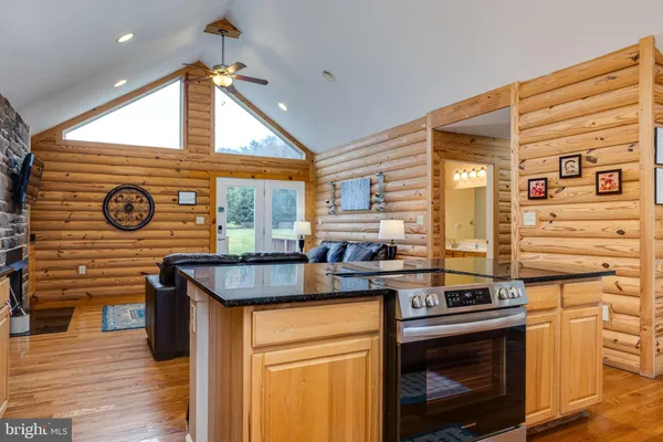 an aerial view of a house with outdoor space