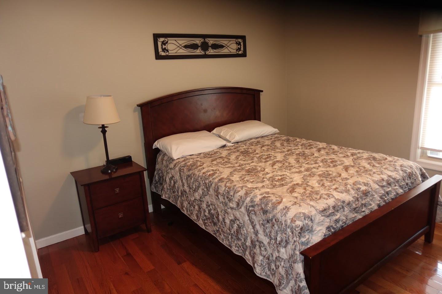 2225 Valley Burg Road Luray, VA 22835 - Photo 56 of 74 a bed sitting in a bedroom next to a window