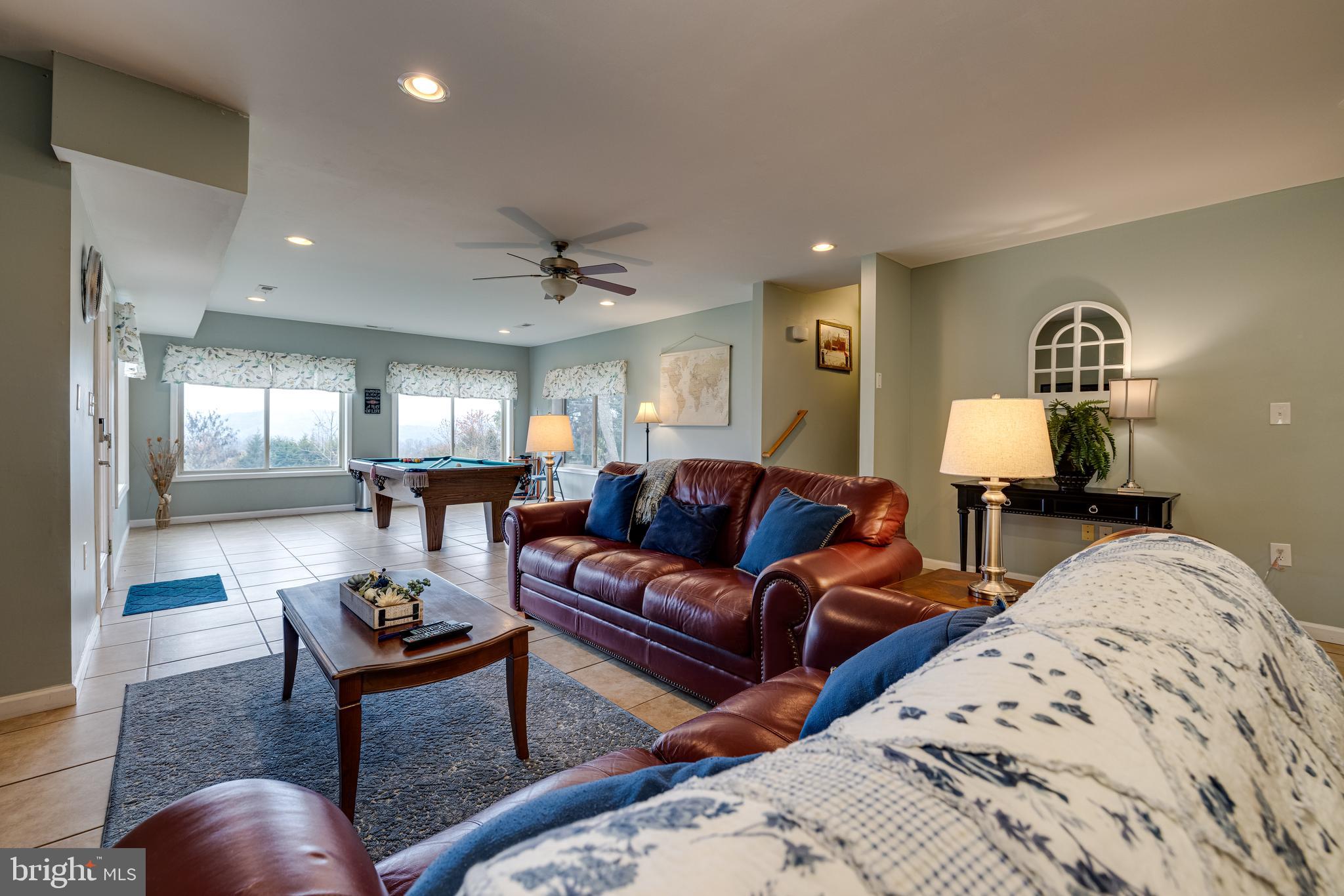 2225 Valley Burg Road Luray, VA 22835 - Photo 59 of 74 a living room with furniture and a wooden floor