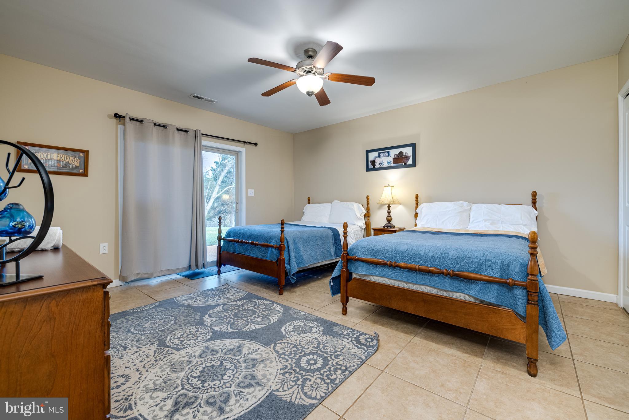 2225 Valley Burg Road Luray, VA 22835 - Photo 65 of 74 a bedroom with bed and a chandelier