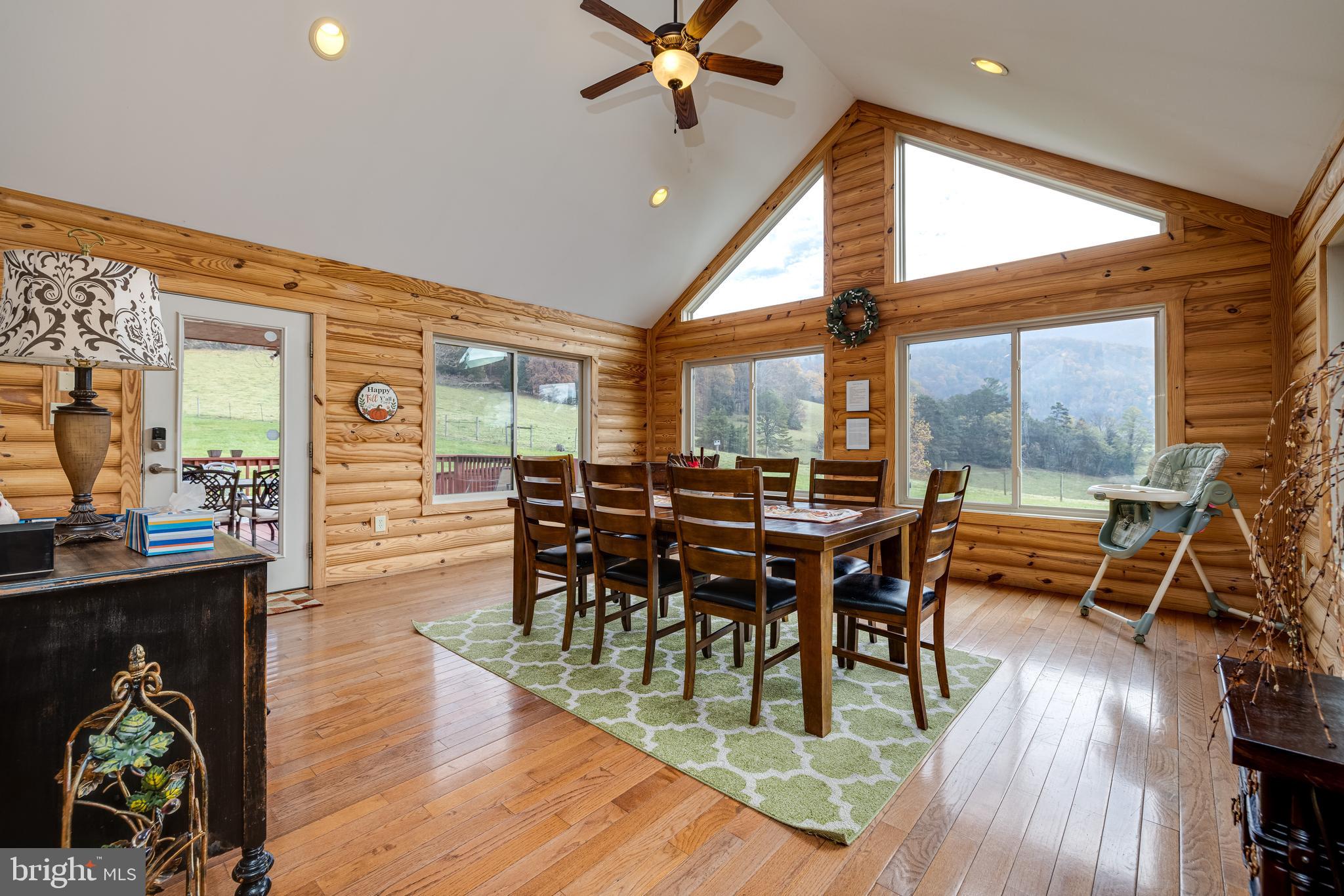 2225 Valley Burg Road Luray, VA 22835 - Photo 8 of 74 a view of a dining room with furniture and wooden floor