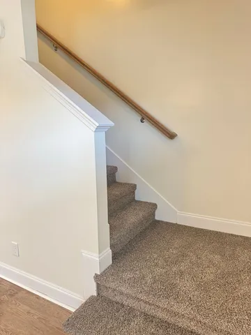 a view of entryway with stairs