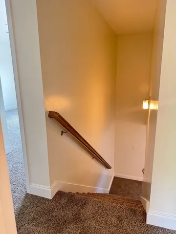 a view of entryway with stairs