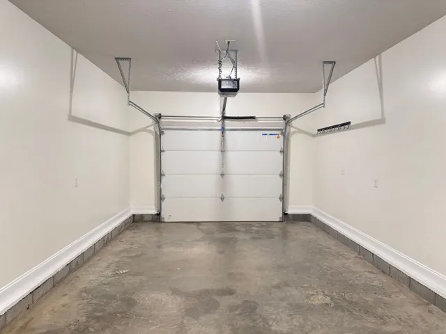 an empty room with fan