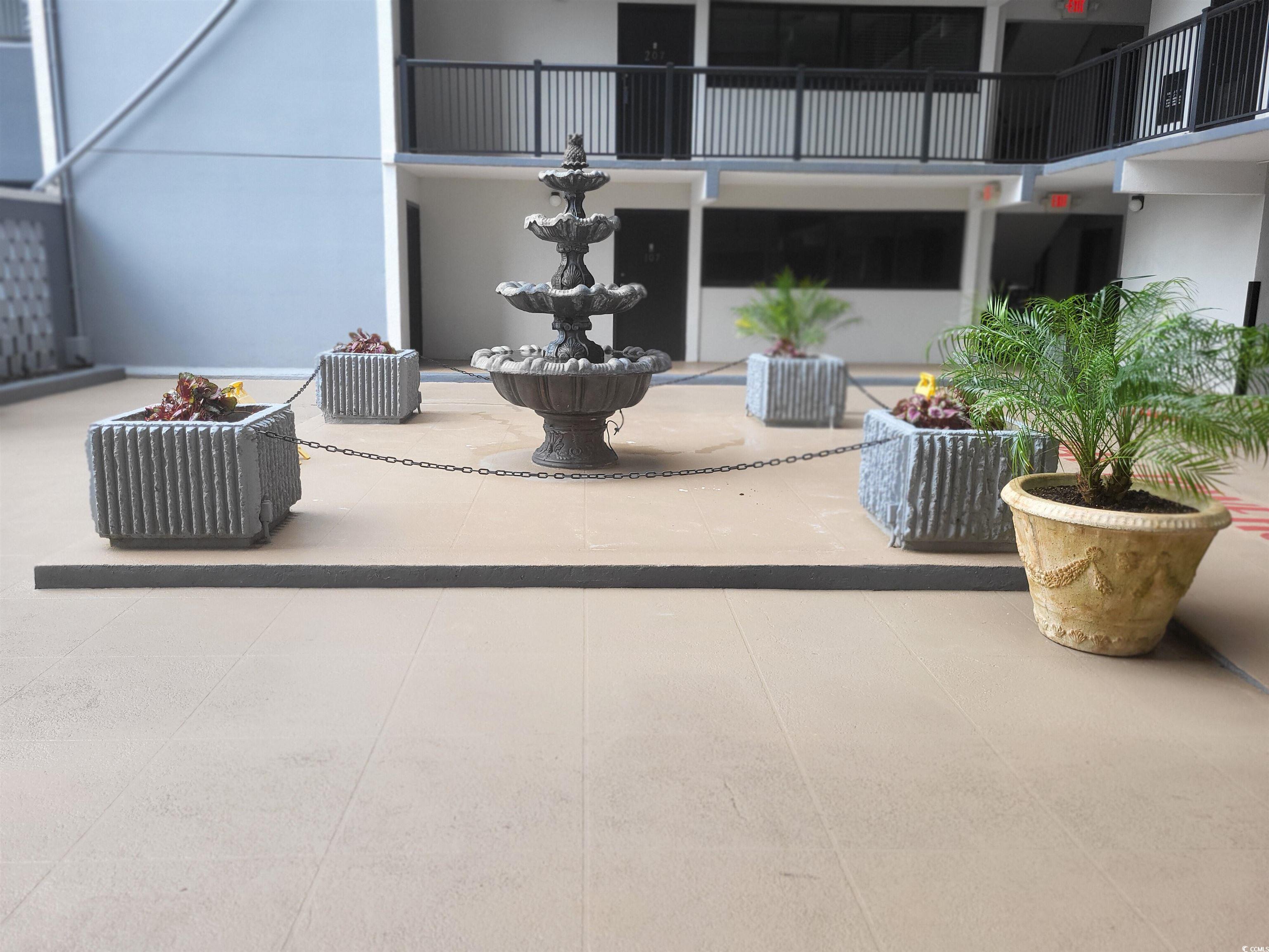 601 Mitchell Drive, Unit 1401 Myrtle Beach, SC 29577 - Photo 24 of 25 Patio / terrace with a patio area