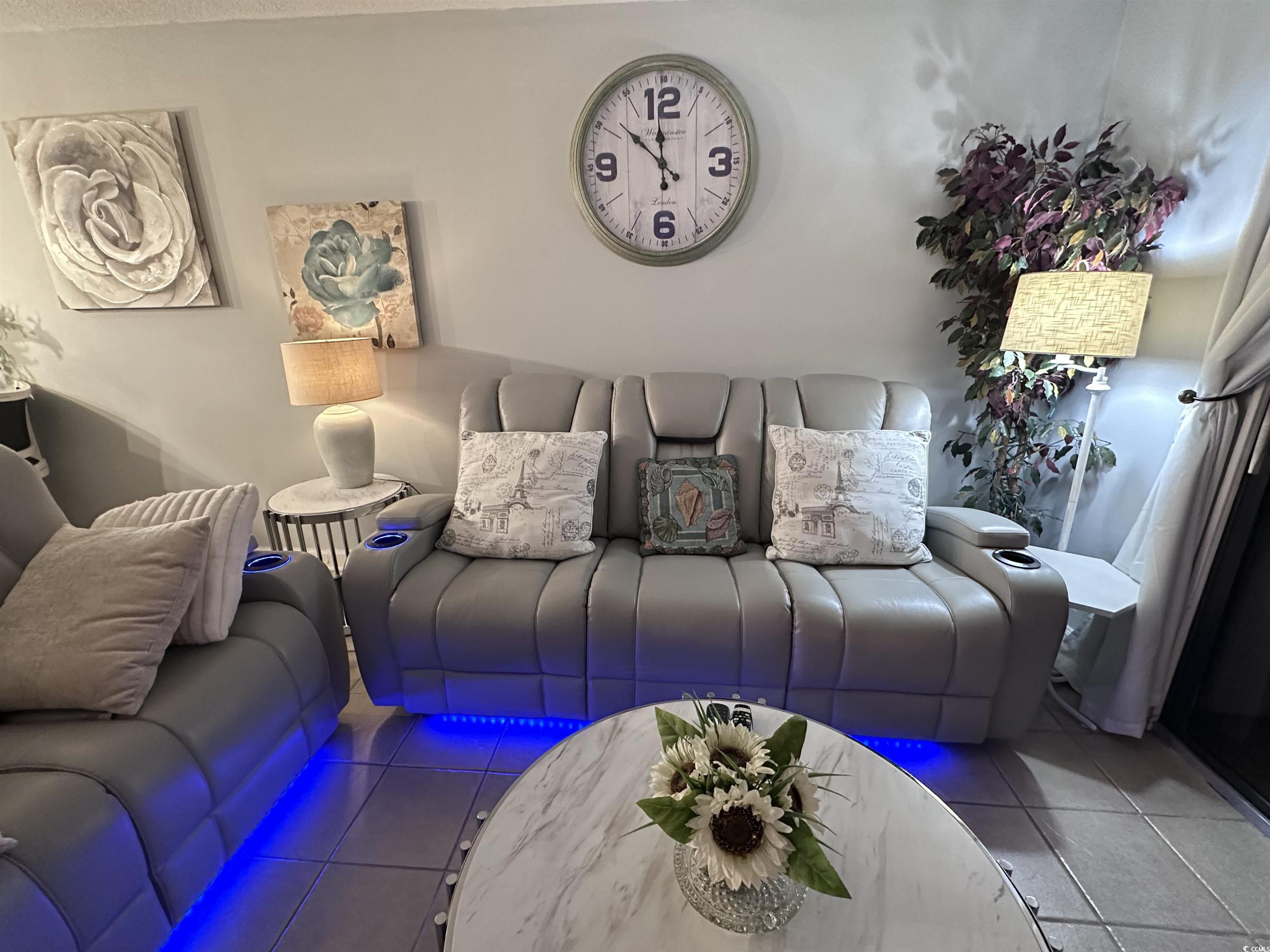 601 Mitchell Drive, Unit 1401 Myrtle Beach, SC 29577 - Photo 5 of 25 Living area with tile patterned flooring