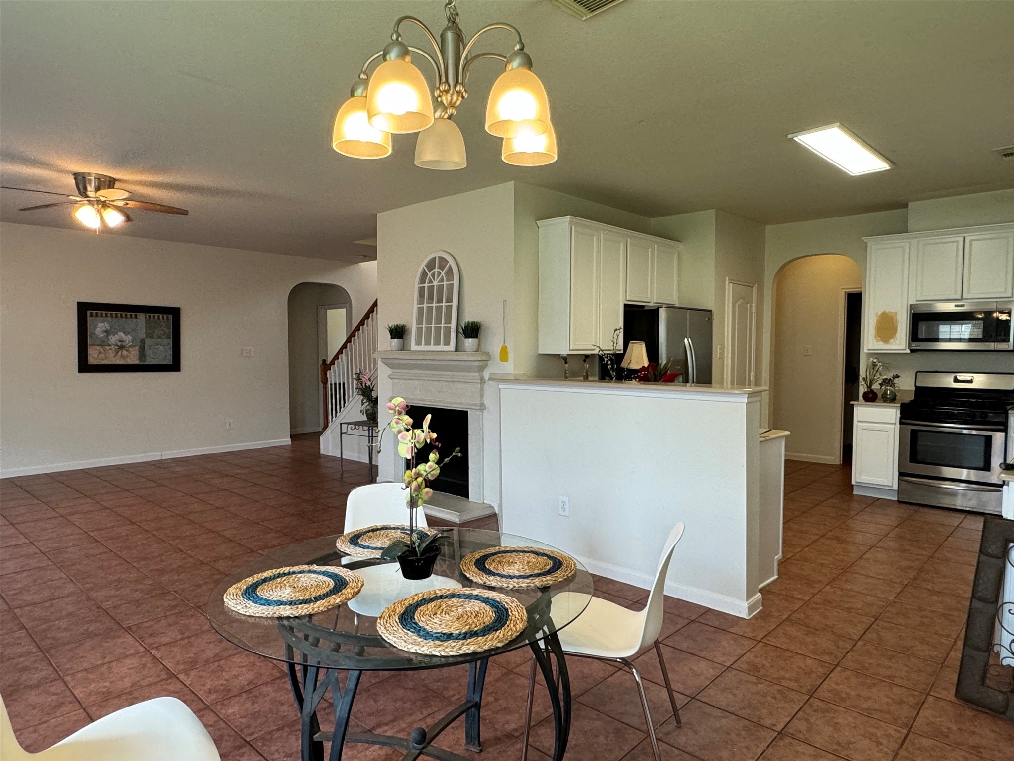 8138 Wooded Terrace Lane Humble, TX 77338 - Photo 14 of 36 a view of a dining room with furniture