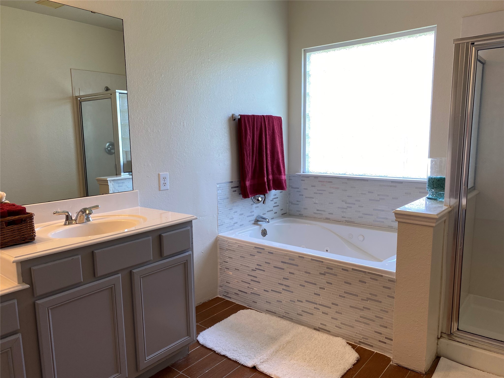 8138 Wooded Terrace Lane Humble, TX 77338 - Photo 20 of 36 a bathroom with a sink and a bathtub