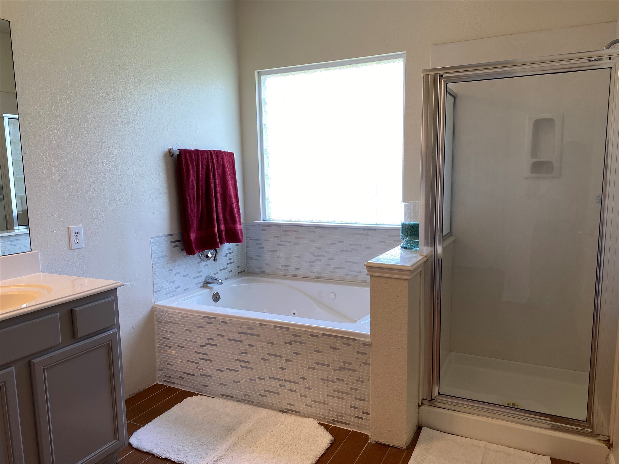 8138 Wooded Terrace Lane Humble, TX 77338 - Photo 21 of 36 a bathroom with a sink a toilet and shower