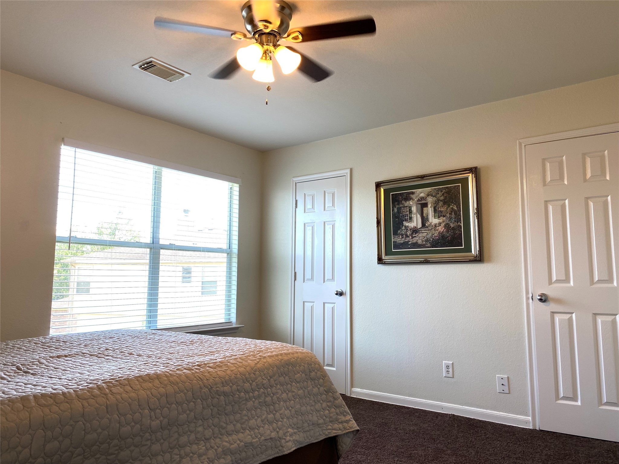 8138 Wooded Terrace Lane Humble, TX 77338 - Photo 34 of 36 a bedroom with a large bed and a window
