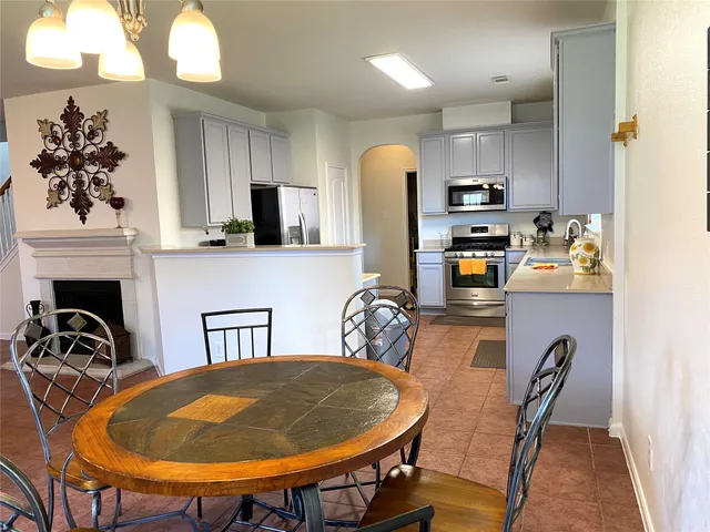 a view of a dining room with furniture
