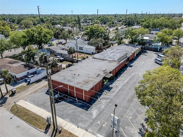 an aerial view of a houses with outdoor space