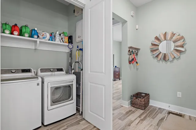 a utility room with dryer and washer