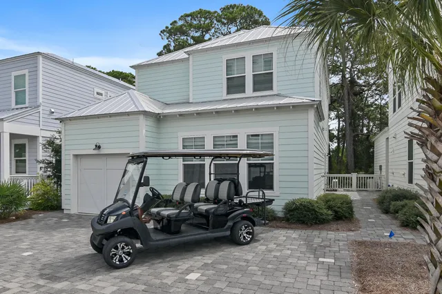 a car parked in front of a house
