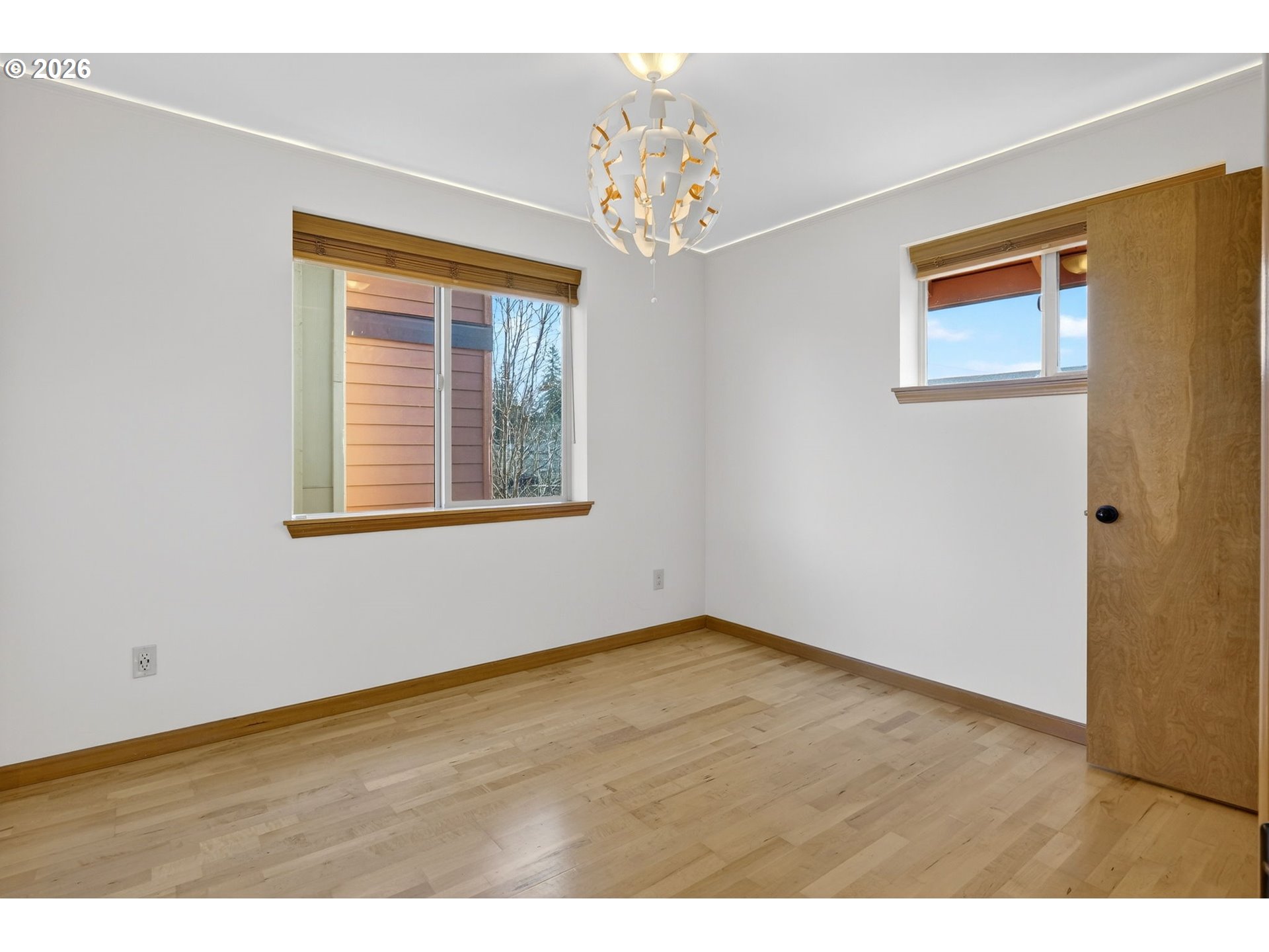 12132 Southeast Pardee Street Portland, OR 97266 - Photo 21 of 35 a view of empty room with window