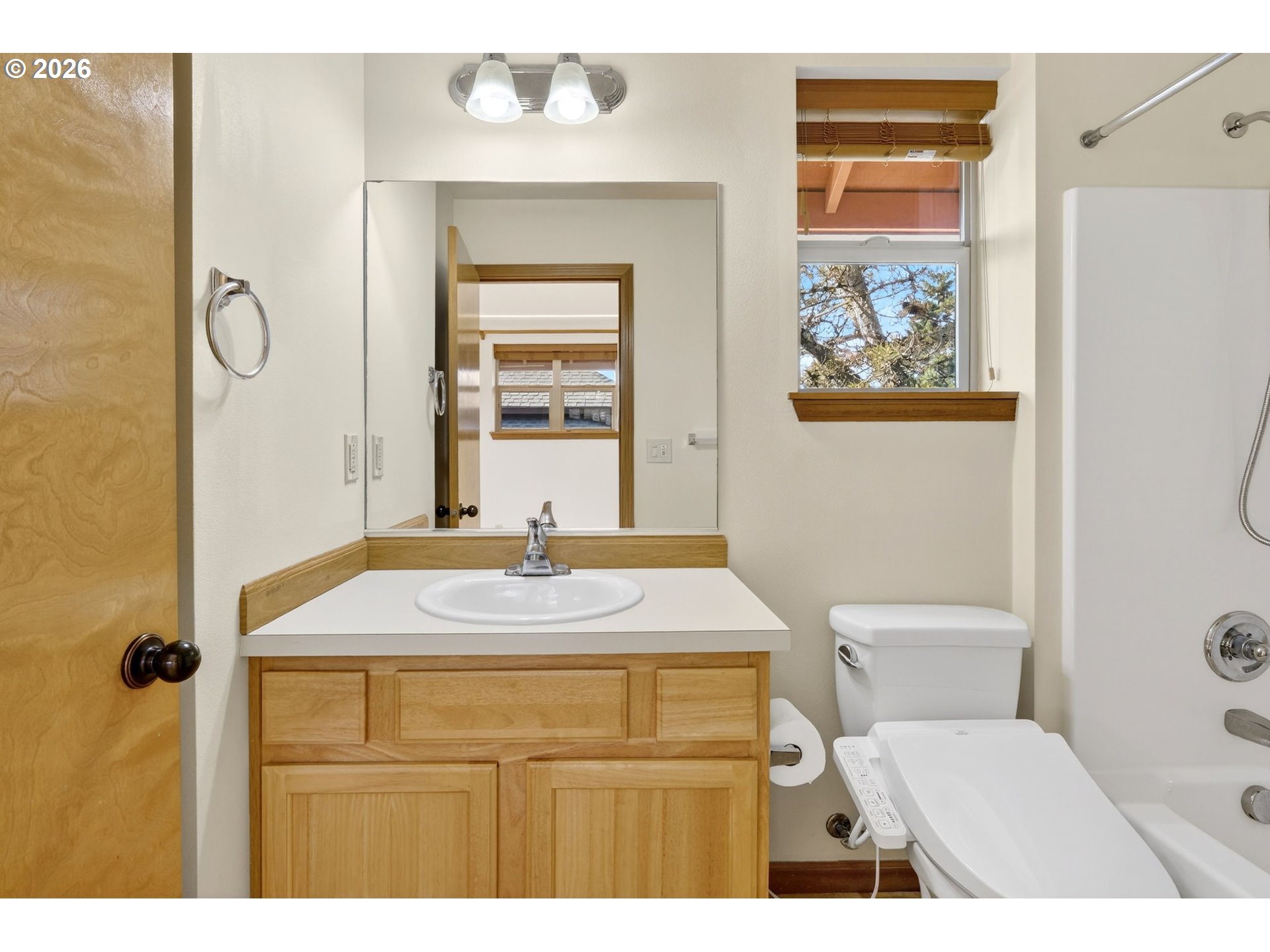 12132 Southeast Pardee Street Portland, OR 97266 - Photo 33 of 35 a bathroom with a sink toilet and shower