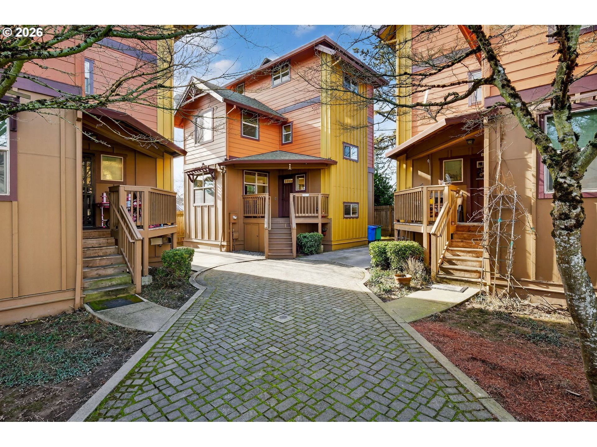 12132 Southeast Pardee Street Portland, OR 97266 - Photo 5 of 35 a view of a house with a patio