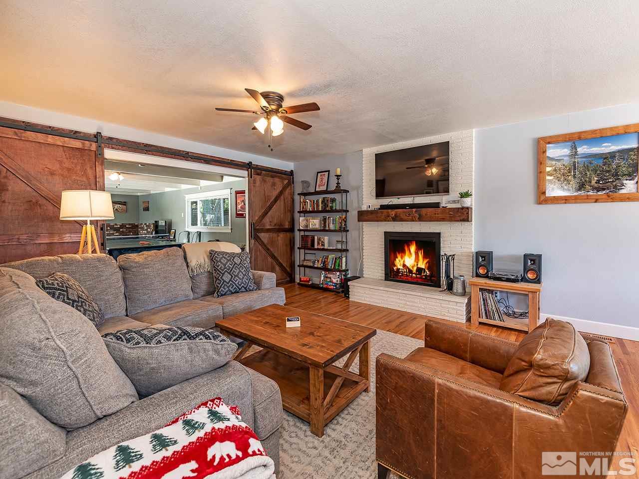 2065 Plumas Street Reno, NV 89509 - Photo 12 of 21 a living room with furniture and a fireplace