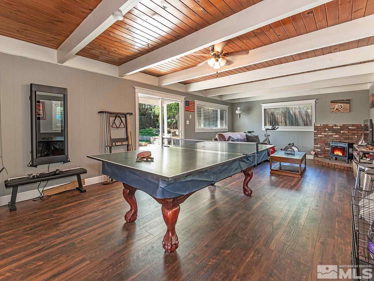 2065 Plumas Street Reno, NV 89509 - Photo 14 of 21 a living room with furniture and a wooden floor