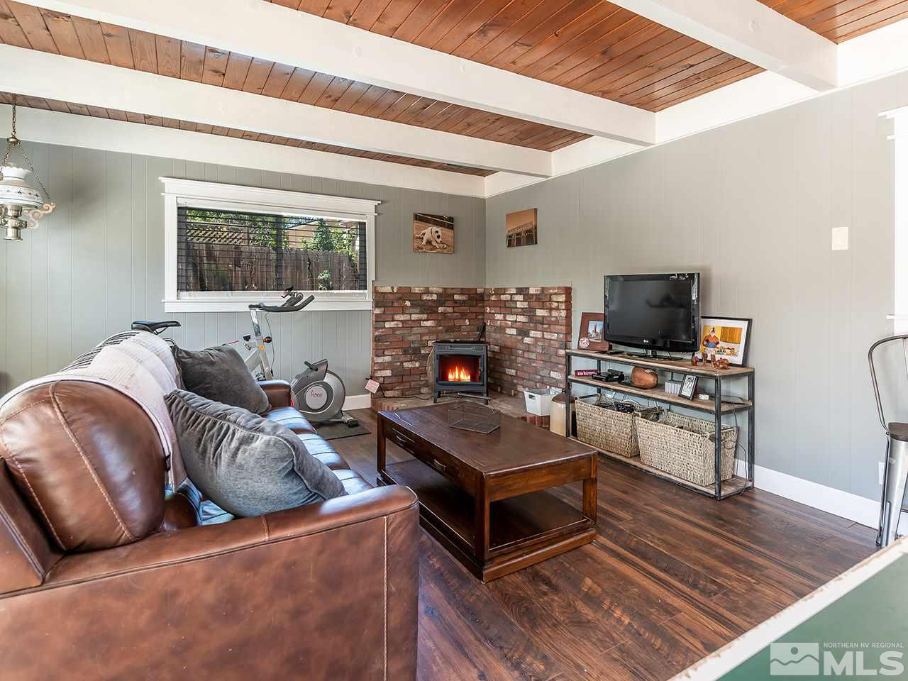 2065 Plumas Street Reno, NV 89509 - Photo 15 of 21 a living room with furniture and a flat screen tv