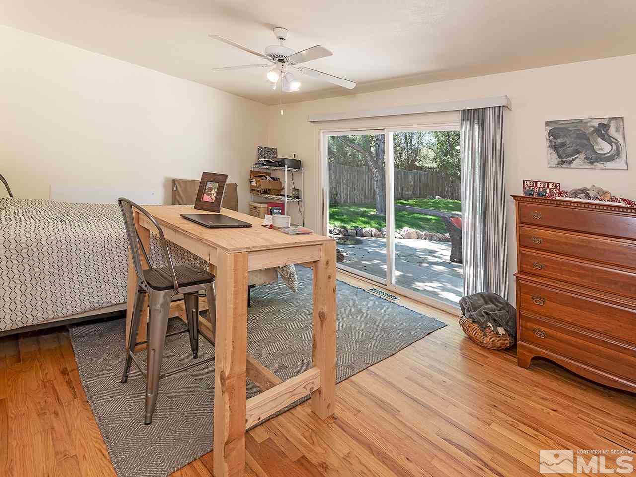 2065 Plumas Street Reno, NV 89509 - Photo 18 of 21 a view of a dining room with furniture window and wooden floor