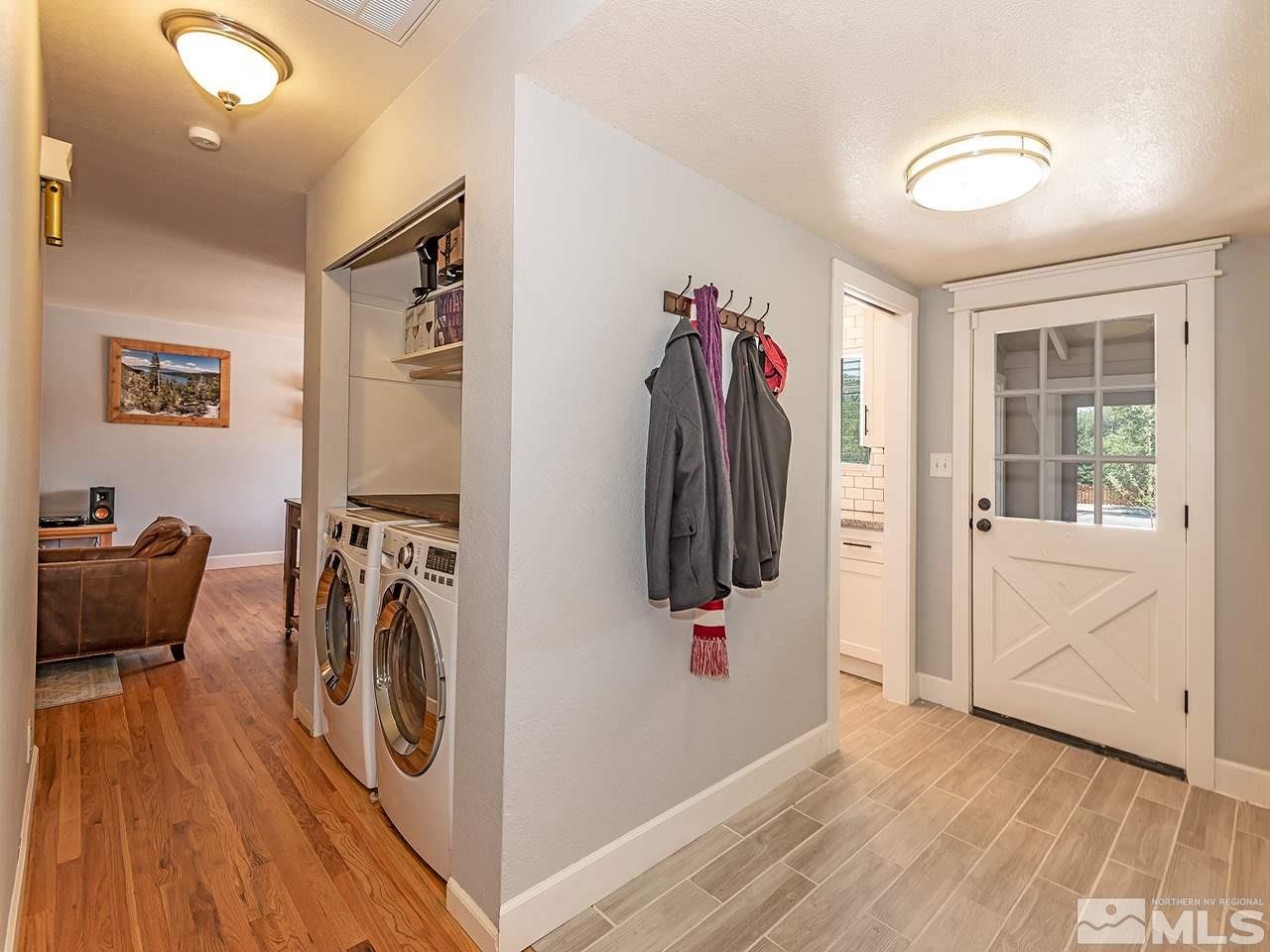 2065 Plumas Street Reno, NV 89509 - Photo 20 of 21 a view of a storage and utility room with washer and dryer