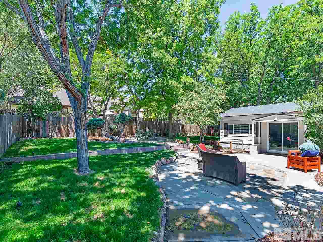 2065 Plumas Street Reno, NV 89509 - Photo 2 of 21 a view of a house with backyard sitting area and garden