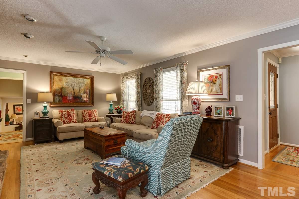 1705 Pony Run Road Raleigh, NC 27615 - Photo 6 of 22 a living room with furniture and wooden floor