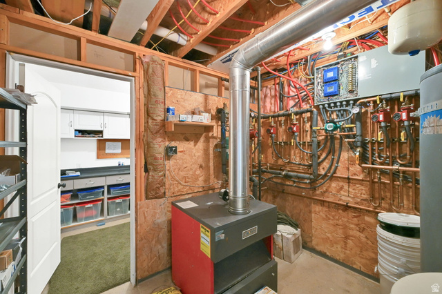 13658 South Fort Street Draper, UT 84020 - Photo 80 of 87 Utility room featuring exposed wood framing, a boiler system, copper piping, and a water heater