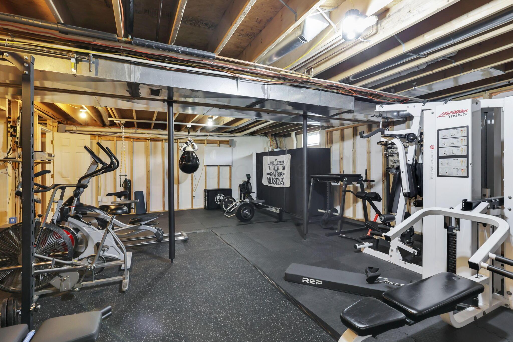 11851 Murlette Road Southwest Stoutsville, OH 43154 - Photo 35 of 44 Basement Gym Area