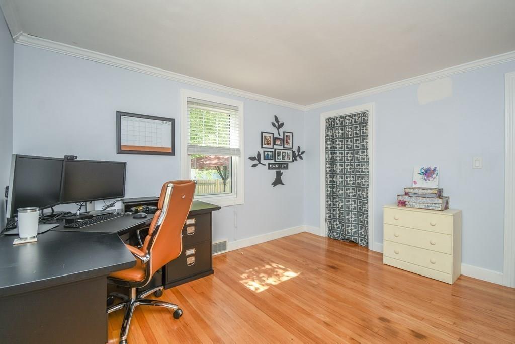 121 Moreland Road Weymouth, MA 02191 - Photo 14 of 40 a bedroom with a workspace