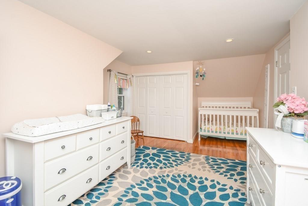 121 Moreland Road Weymouth, MA 02191 - Photo 17 of 40 a bedroom with a bed and a dresser