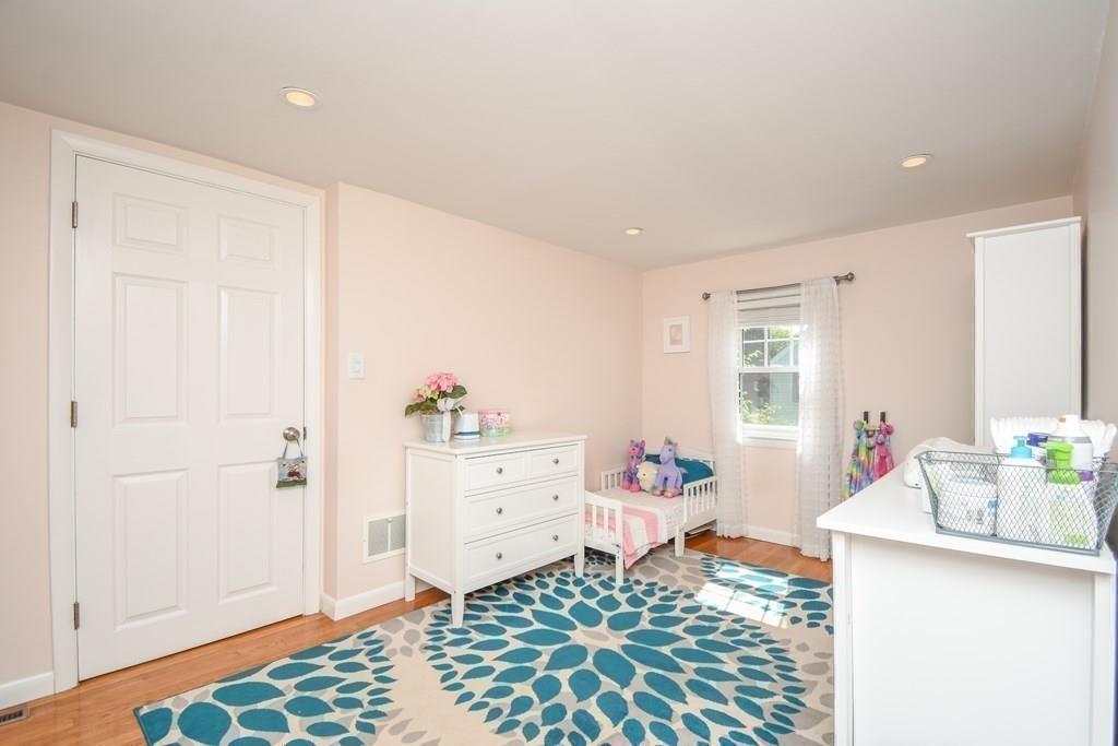 121 Moreland Road Weymouth, MA 02191 - Photo 18 of 40 a bedroom with furniture and a window