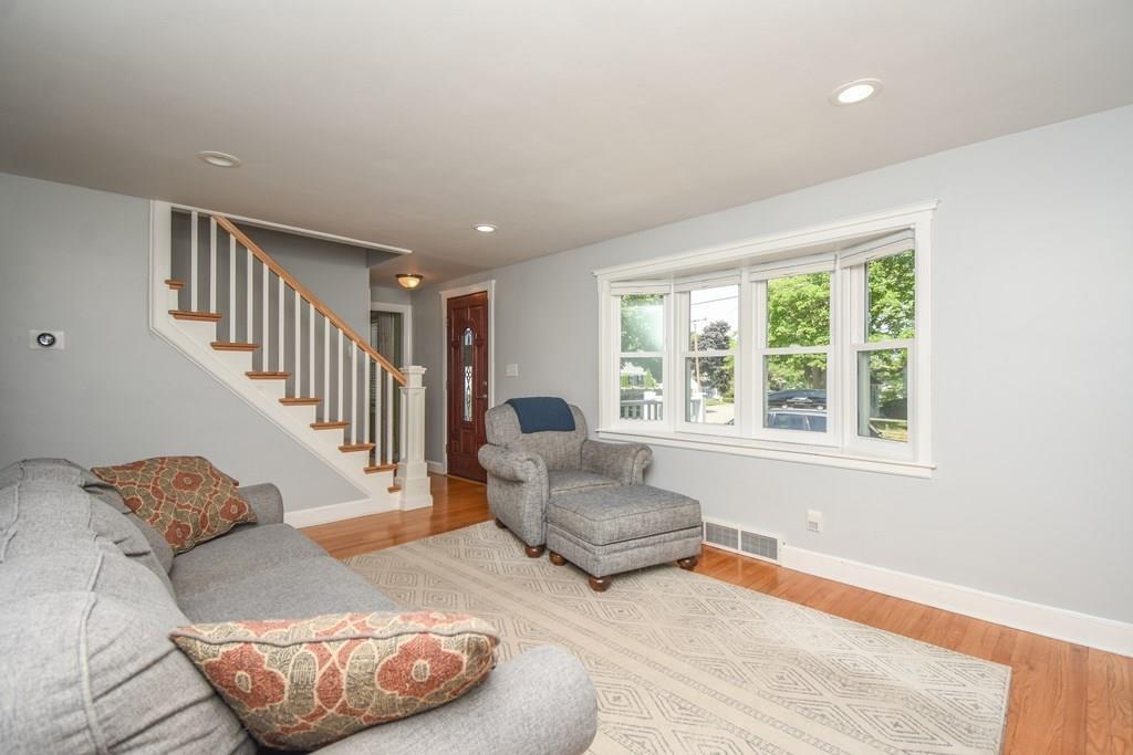 121 Moreland Road Weymouth, MA 02191 - Photo 2 of 40 a living room with furniture and a large window