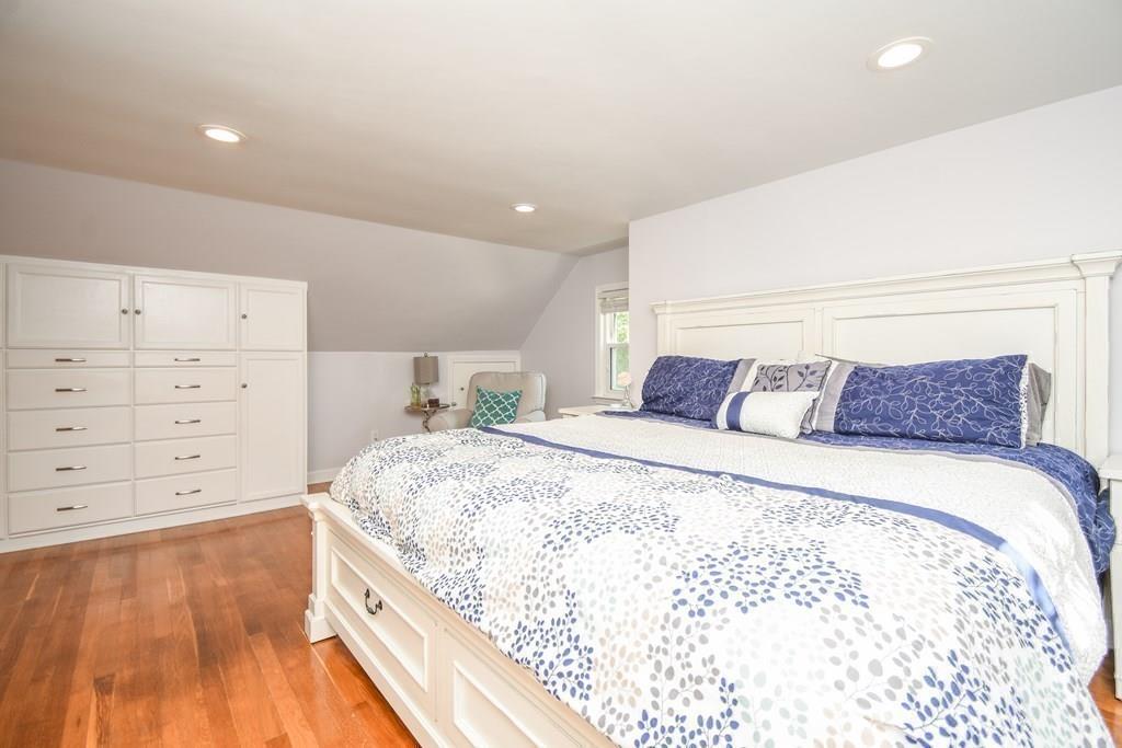121 Moreland Road Weymouth, MA 02191 - Photo 22 of 40 a bedroom with a large bed and a dresser