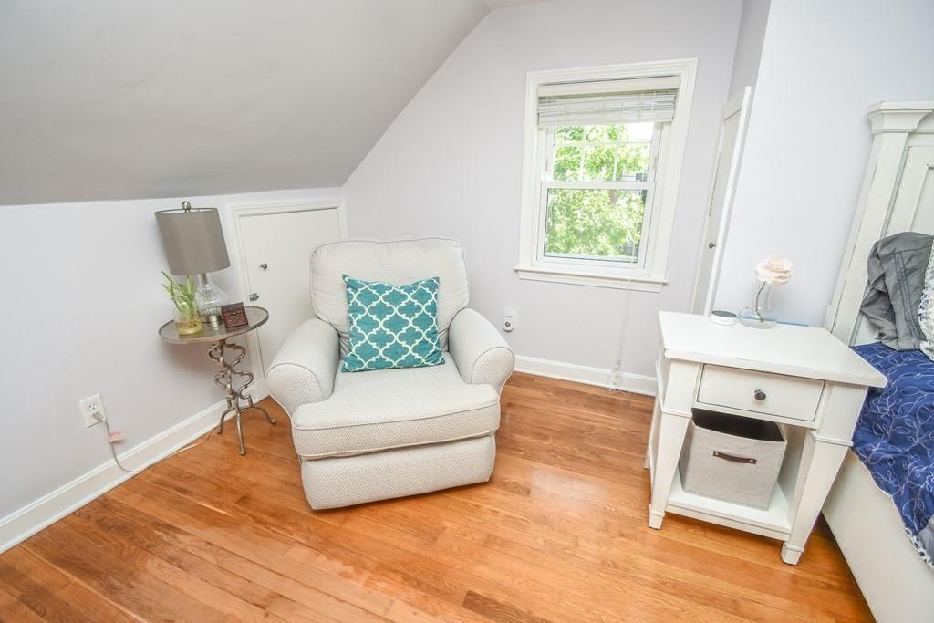 121 Moreland Road Weymouth, MA 02191 - Photo 23 of 40 a living room with furniture and a fireplace