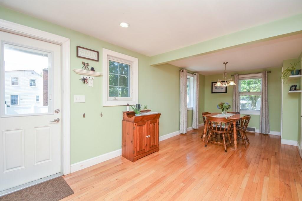 121 Moreland Road Weymouth, MA 02191 - Photo 9 of 40 a view of a dining room with furniture window and wooden floor
