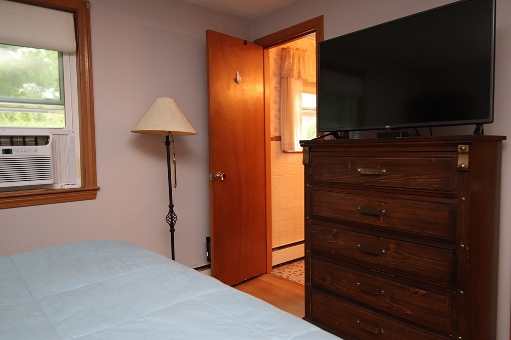 61 Central Street Saugus, MA 01906 - Photo 15 of 42 a view of room with flat screen tv and hardwood floor