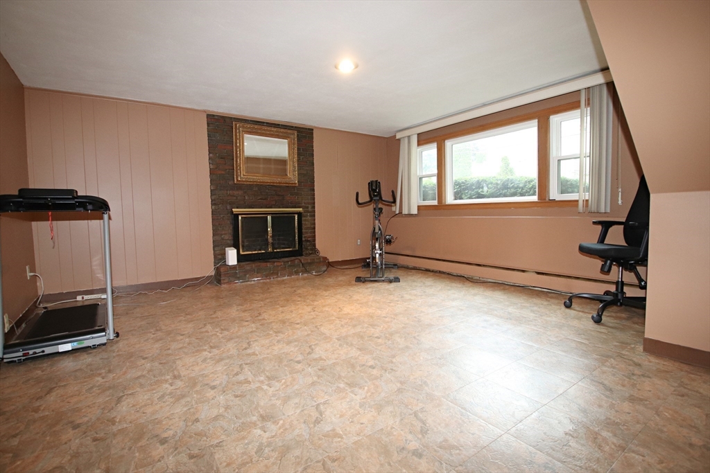 61 Central Street Saugus, MA 01906 - Photo 26 of 42 a room with furniture and a window