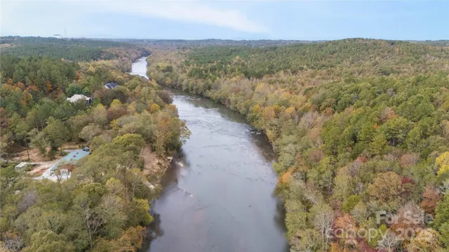 a view of a lake with mountains in the background