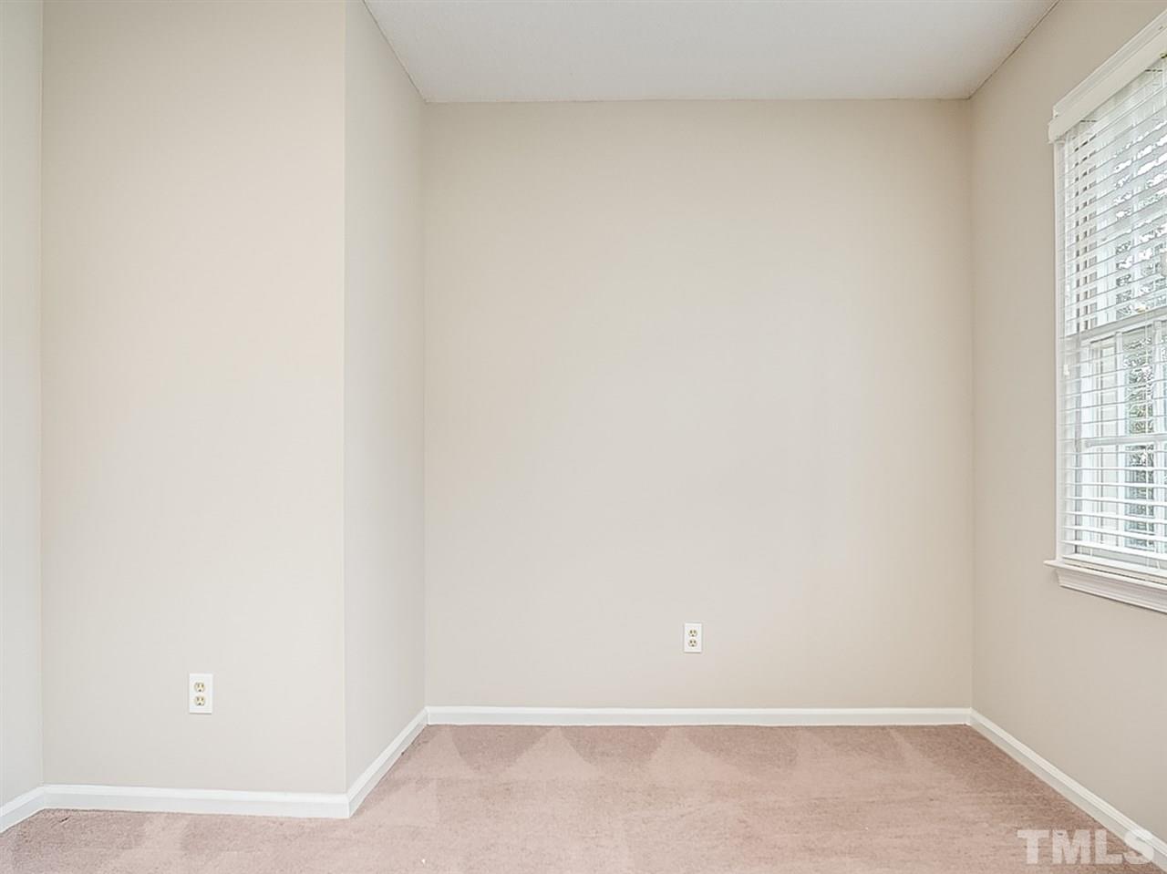 5813 Edgebury Road Raleigh, NC 27613 - Photo 14 of 21 a view of an empty room and a window