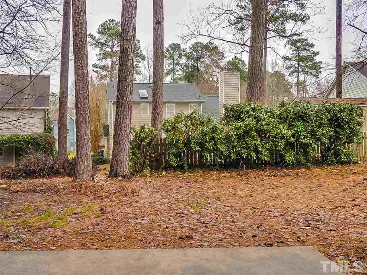 5813 Edgebury Road Raleigh, NC 27613 - Photo 19 of 21 a view of a pathway with a house