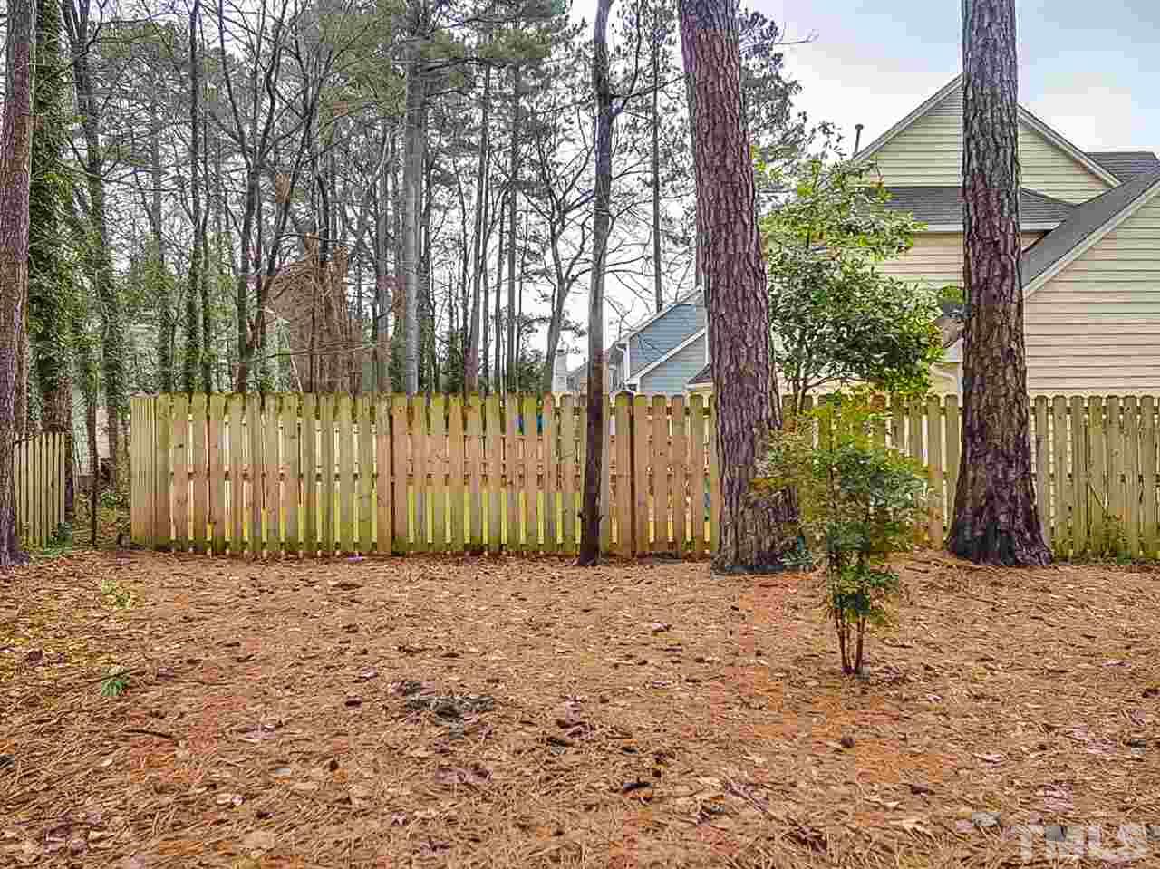 5813 Edgebury Road Raleigh, NC 27613 - Photo 20 of 21 a view of a backyard of the house