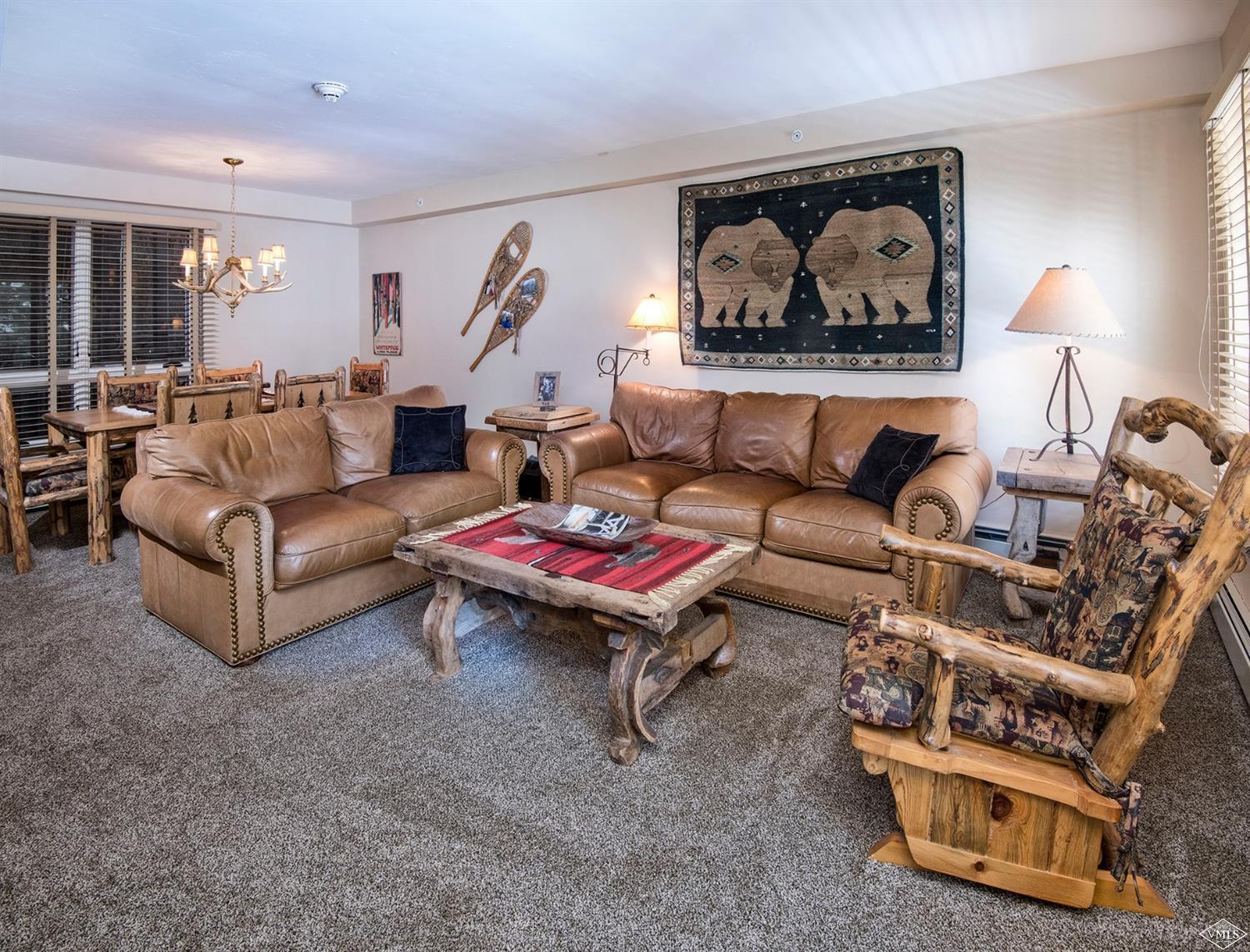993 Lions Ridge Loop, Unit 325 Vail, CO 81657 - Photo 5 of 19 a living room with furniture and a couch