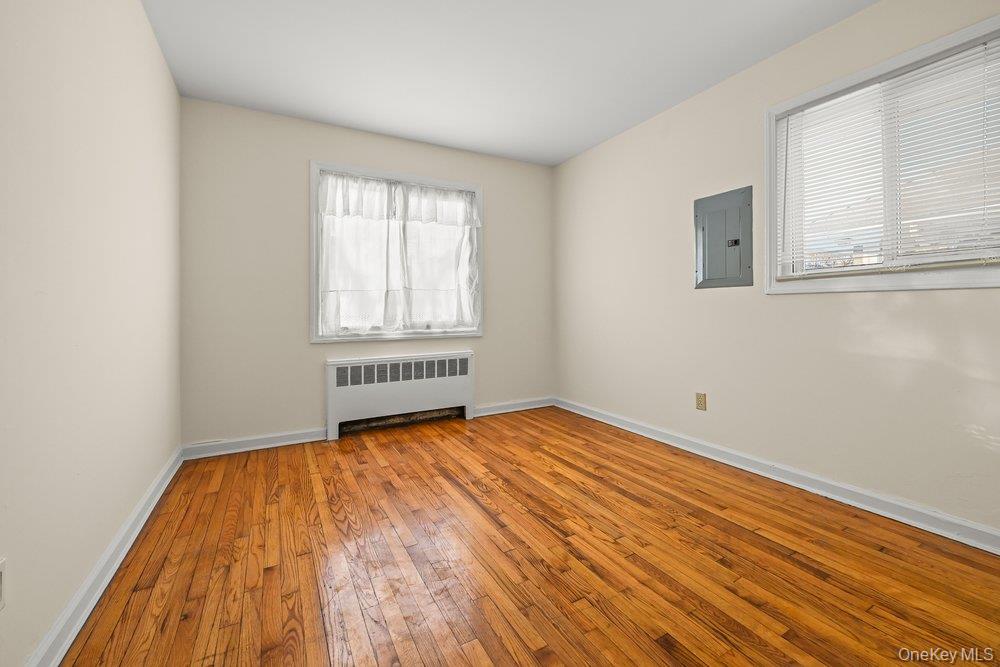40 Firwood Road, Unit MAIN ST Port Washington, NY 11050 - Photo 7 of 18 a view of an empty room and window