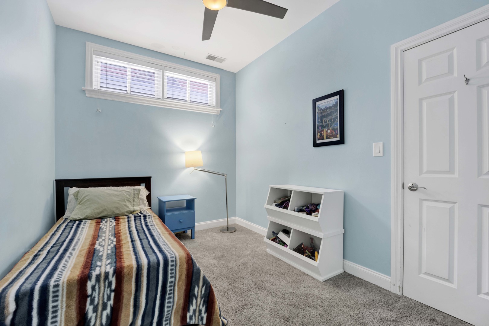 218 South Laflin Street, Unit 101 Chicago, IL 60607 - Photo 13 of 22 a bedroom with a bed and a window